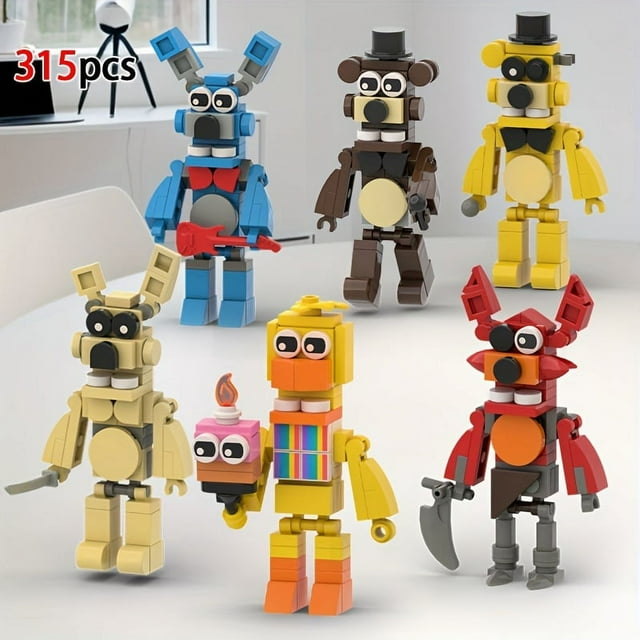 315pcs Creative Horror Game Toys featuring bear-themed assembly splicing building blocks. The set includes six colourful cartoon mini action figure toys resembling characters with unique designs, such as a blue bear with a bowtie and guitar, a yellow bear with a top hat, and a red fox with a hook. Ideal as a hand-made model, birthday gift, or Christmas gift. Displayed on a white table in a modern room setting.