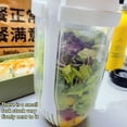 thumbnail image 4 of Vaso mezclador de ensaladas Keep Fit con tenedor y soporte para aderezos, recipiente para la salud, desayuno vegetal portátil, 4 of 6