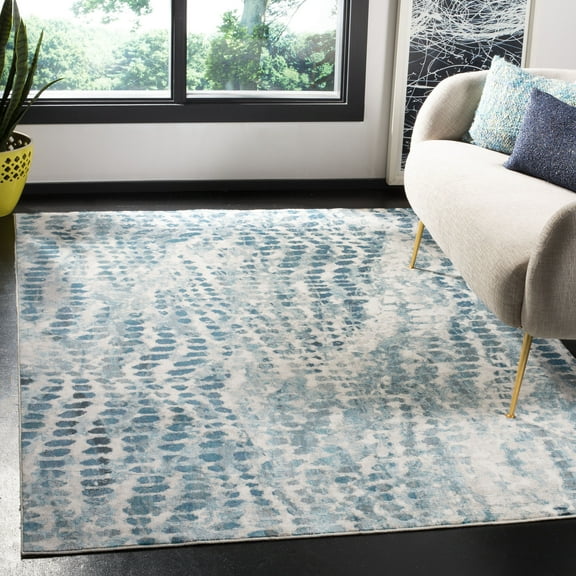 SAFAVIEH Aria Cian Geometric Dots Area Rug, Cream/Teal, 5'1" x 7'6"