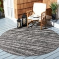 thumbnail image 2 of SAFAVIEH Courtyard Kasandra Abstract Indoor/Outdoor Area Rug, Black/Ivory, 6'7" x 6'7" Round, 2 of 10