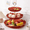 Red, variant on Elegant Three-Tier Plastic Cake Stand with Gold-Rimmed Wave Design, Perfect for Displaying Desserts, Wedding Cakes, Birthday Celebrations, and Serving Cupcakes, Fruits, and Bread