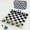 black and white, variant on DGZEOLOO Chess Set Portable Rollable Travel Game for Ages 14+, PU & ABS Pieces with Storage Bag, 1-Count, Exclusively for Teens & Adults