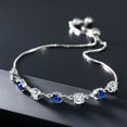 thumbnail image 3 of Gem Stone King 925 Sterling Silver Round White Moissanite and Blue Created Sapphire Tennis Bracelet for Women (2.37 Cttw, Gemstone Birthstone, Round 4.5MM, Fully Adjustable up to 9 inch), 3 of 4
