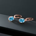 thumbnail image 5 of Gem Stone King 18K Rose Gold Plated Silver Swiss Blue Topaz Leverback Dangle Earrings for Women (4.50 Cttw, Gemstone November Birthstone, Oval 9X7MM), 5 of 5