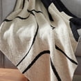 thumbnail image 3 of SAFAVIEH Cleon Contemporary Black/Ivory Abstract Cotton Throw, 50" x 60", 3 of 6