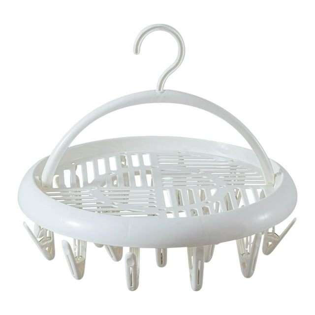 Percha con pinzas para secar calcetines y ropa. Un blanco