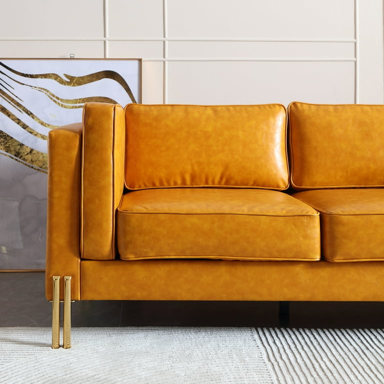 Leather sofa with 2025 velvet cushions