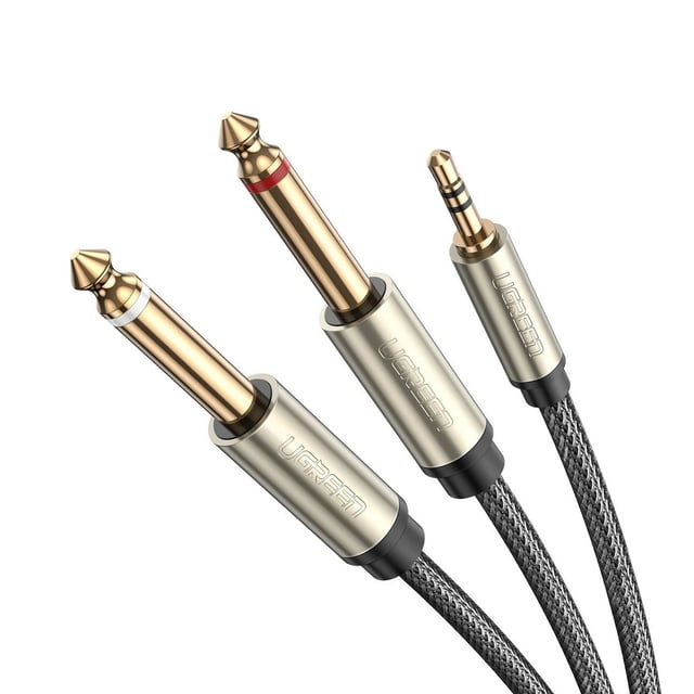 cable audio 3.5mm a doble 6.35 mm ugreen 10615 audio estéreo de 2m Cable estéreo UGREEN 3.5 mm a dos jacks 6.35 mm, primer plano de conectores chapados en oro con anillos rojo y blanco; cable negro con trenza de nailon y ramales en Y de 23 cm; conductor OFC y blindaje interno según especificación, ideal para interconectar dispositivos de audio y uso en estudios domésticos.