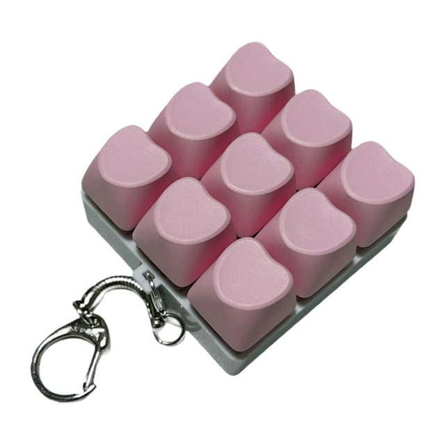Llavero con teclado mecánico de 9 teclas, juguete antiestrés para adultos y niños. Rosa