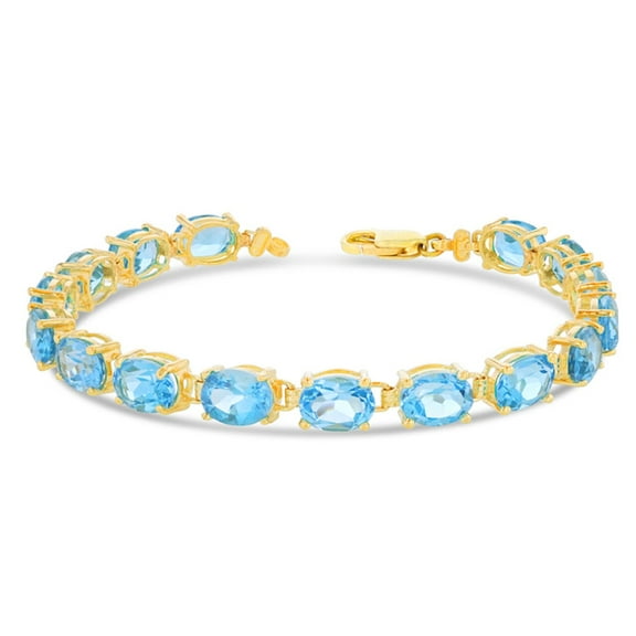 Oval Genuine Blue Topaz (8 X 6) Tennis Bracelet In Yellow Gold