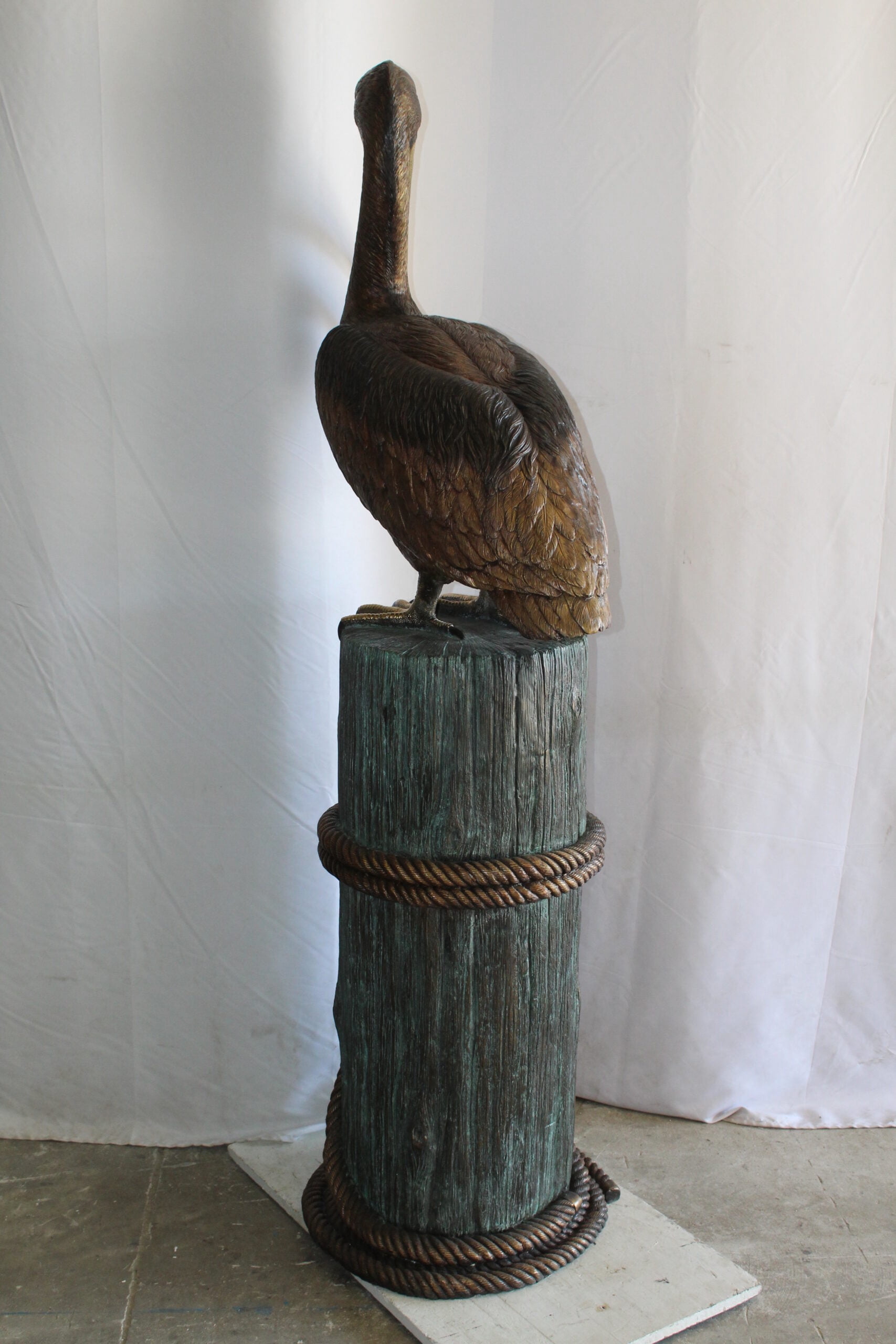 Nifao Pelican Outdoor Fountain Statue Mounted on Tree Stump, Lifesize Bronze Garden Water Feature for Patio & Yard – Garden Outdoor Decor Sculpture, 33"L x 23"W x 73"H