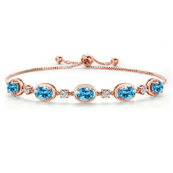 Gem Stone King 18K Rose Gold Plated Silver Swiss Blue Topaz Bracelet for Women | 5.00 Cttw | Gemstone November Birthstone | Oval 7X5MM | Fully Adjustable 9 inch