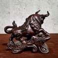 thumbnail image 3 of Ebony wood carved ox figurine, symbolizing good fortune and soaring success, perfect for living room, company desk, office desk, or business opening., 3 of 3
