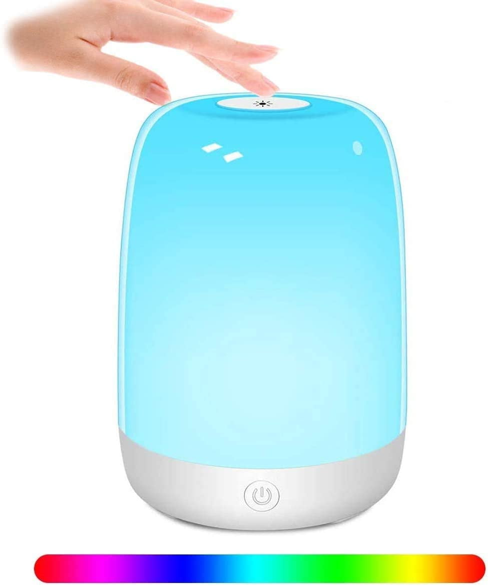 The bedside lamp can be touched and dimmed. The LED table lamp