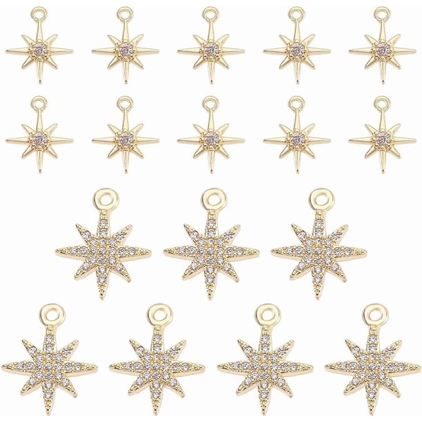 17 piezas de dijes de latón chapado en oro con circonitas, colgantes de estrella del norte con diamantes de imitación.