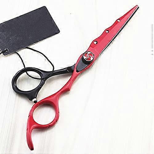 Tijeras de peluquería profesionales de acero inoxidable japonés con mango ergonómico.