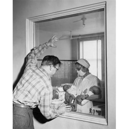 Posterazzi Sal2557965 Female Nurse Showing Two Newborn