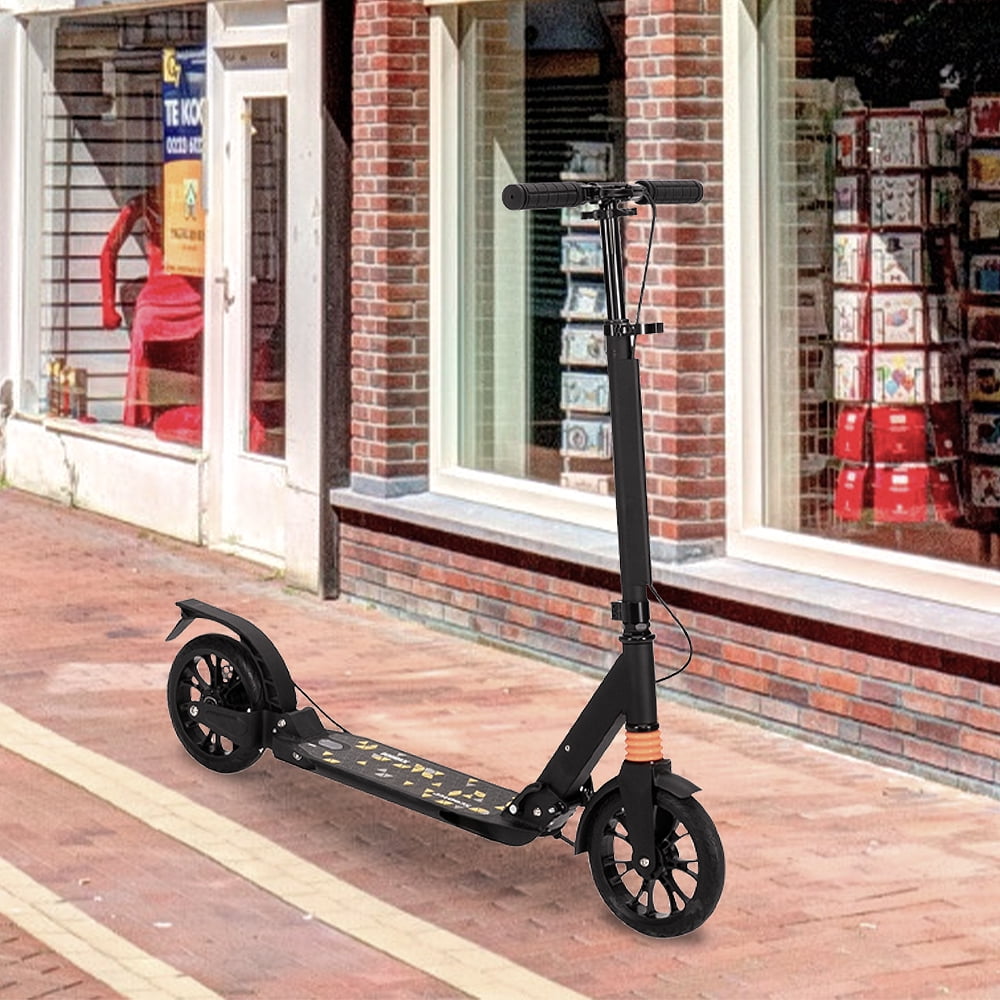 adults on scooters