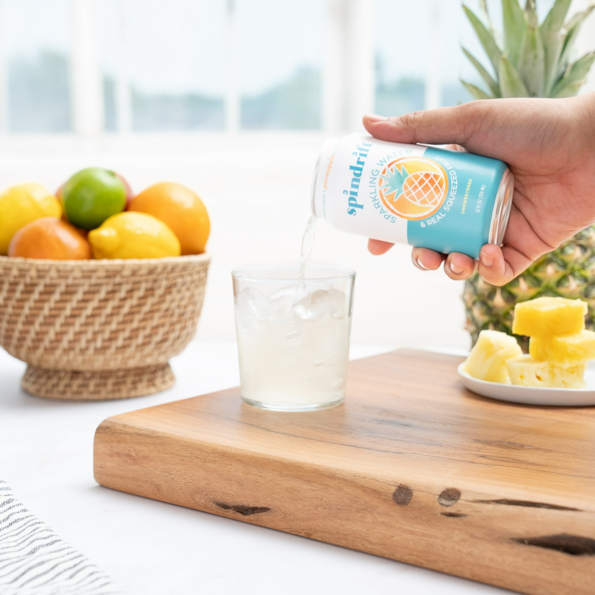 Spindrift Sparkling Water , Pineapple Flavored, Made with Real Squeezed fruit, 12 fl oz, 8 count, No Sugar Added, 15 Calories per Can