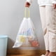thumbnail image 1 of Bolsas de basura con cordón de 4 galones | 30 unidades | 45 x 50 cm | Resistentes y a prueba de fugas | Para cocina, baño, oficina y coche | Amarillas, 1 of 6