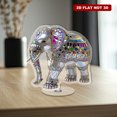 thumbnail image 4 of Rotating acrylic ornament featuring a translucent stained glass Indian jeweled white elephant reflecting rainbow light with an elegant sophisticated design and white background, 4 of 8