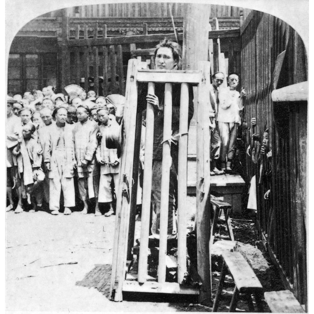 China Punishment C1900 Na Criminal In Shanghai China Being Punished By Confinement In A Cage In