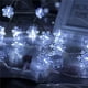 thumbnail image 4 of Luces navideñas FloreceBien, cadena de luces LED con forma de copo de nieve de 20 pies y 40 luces LED a pilas, impermeables, para dormitorio, patio, habitación, jardín, fiesta, hogar, decoración, 4 of 6
