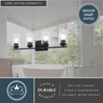 thumbnail image 6 of Park Ridge 4-Light 27.5 in. Wide Matte Black Transitional Bathroom Vanity Lighting Fixture, Clear Cylinder Glass Shade, Dimmable, LED Compatible, Over the Mirror Mounted Steel Wall Sconce, 6 of 12
