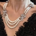 thumbnail image 2 of Layered Pearl Bow Necklace for Women, Multi Layer Choker with Heart Butterfly Cross Pendant, Vintage French Style Faux Pearl Chain Jewelry for Daily Wear Party Gift, 2 of 9