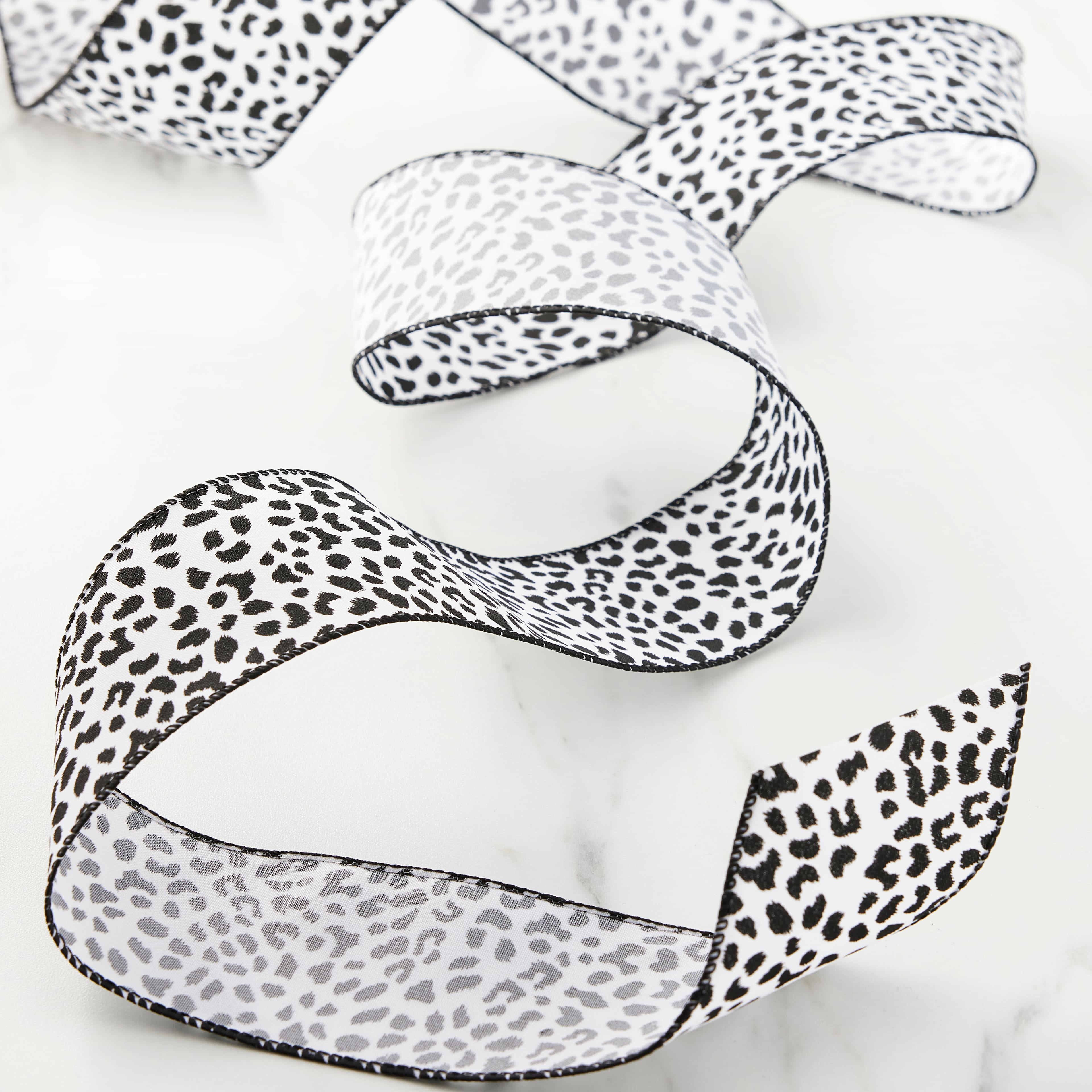 12 Pack: 2.5" x 25ft. Faux Cotton Wired Leopard Ribbon by Celebrate It