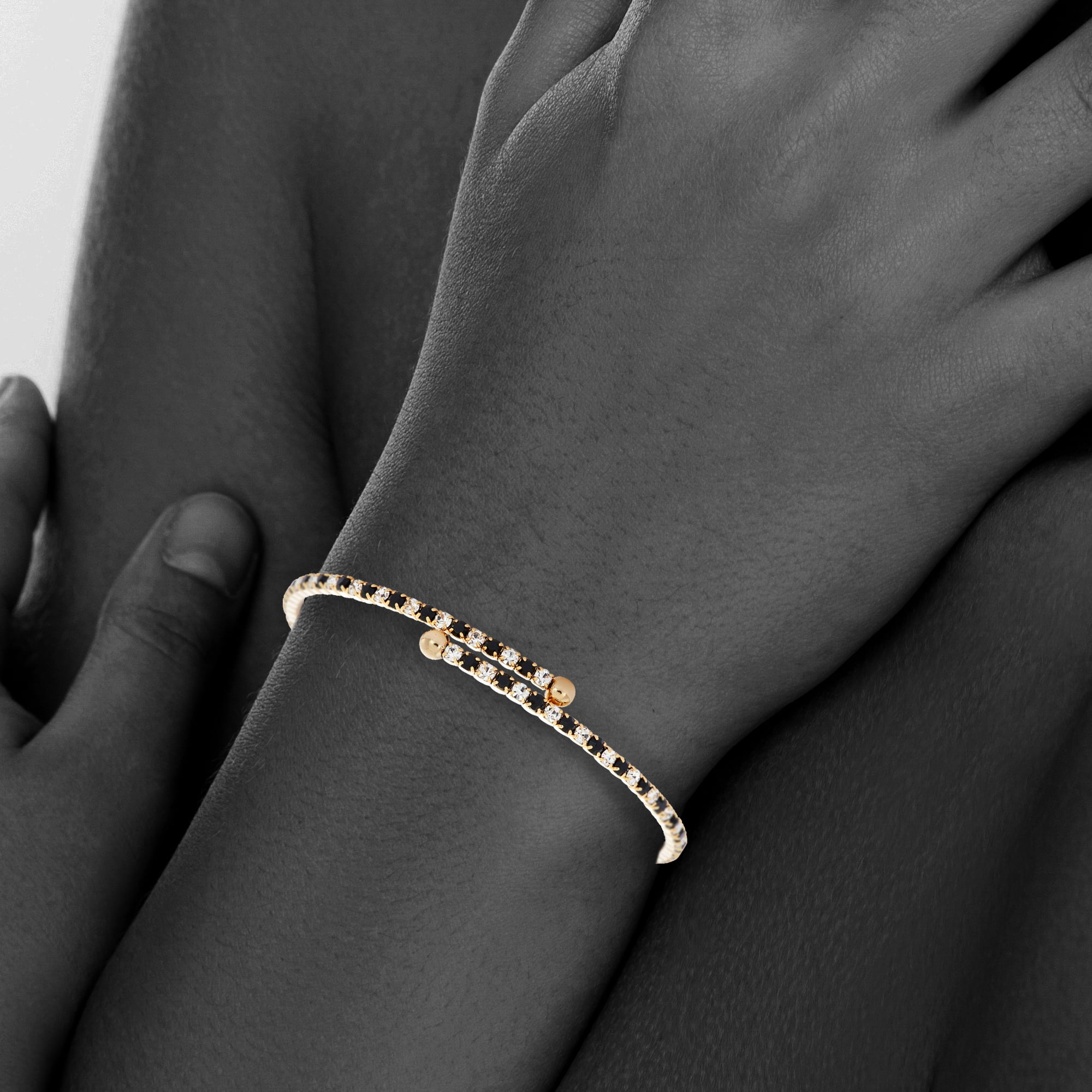 X & O 14KT Gold Plated Crystal Single Row Flex Bangle in Jet and White Crystal Combination