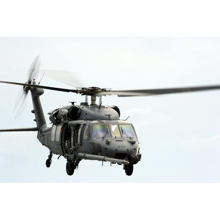 An HH-60 Pave Hawk helicopter conducts search and rescue operations Canvas Art - Stocktrek Images (34 x