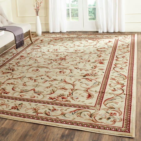 SAFAVIEH Lyndhurst Beatrix Floral Area Rug  Ivory  9  x 12 Lyndhurst Rug Collection. Luxurious EZ Care Area Rugs. The Lyndhurst Collection features luxurious  easy care  easy-maintenance area rugs made to add long lasting charm and decorative beauty even in the busiest  high traffic areas of the home. Hand tufted using a blend of soft yet durable synthetic yarns styled in traditional Persian florals  interwoven vines and intricate latticework. Use the Lyndhurst rugs in your home for an elegant and transitional upgrade.