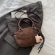 thumbnail image 1 of Bolso de mano sencillo de color liso para mujer 2025, bolso bandolera de gran valor, tendencia de bolso de bolos para mujer popular este año, 1 of 5