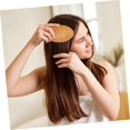 thumbnail image 5 of Cepillo masajeador del cuero cabelludo y peine de bambú para desenredar el cabello y eliminar nudos suavemente., 5 of 5