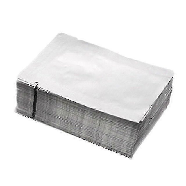 100pcs silver heat seal aluminum foil food storage bags vacuum sealable pouches Montón de 100 bolsas plateadas mylar con abertura superior, vista frontal en primer plano; pilas planas con acabado metálico brillante y bordes apilados visibles. Diseñadas para sellado por calor y sellado al vacío según especificaciones; útiles para snack, café, muestras o accesorios de cocina. Tallas disponibles 5 x 7 cm, 10 x 15 cm y 15 x 22 cm. También se usan con frecuencia para guardar muestras pequeñas o detalles para fiestas.