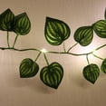 thumbnail image 4 of ZOELNIC Battery Operated Vine Fairy String Lights 20LED Artificial Leaf Hanging Garland Light for Christmas Wedding Bouquets Party Event Home Decor, 4 of 11
