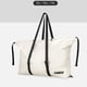 thumbnail image 4 of Bolsa de viaje de lona, ​​bolso de hombro de gran capacidad, resistente al agua, plegable y enrollable. Blanco L, 4 of 9