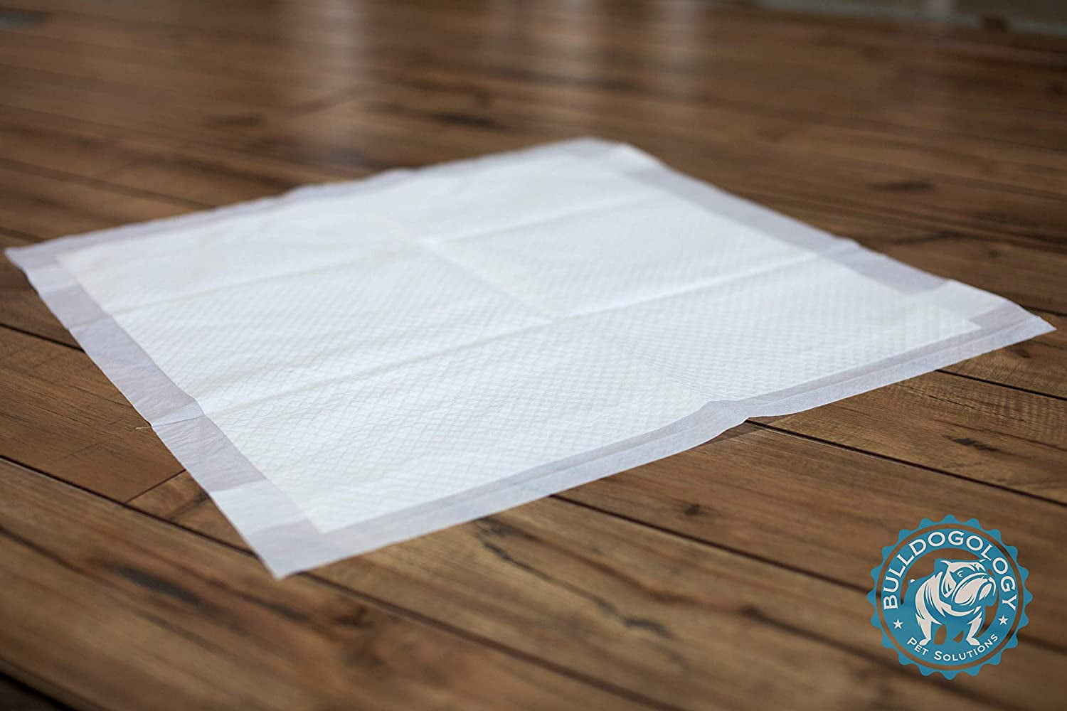 Bulldogology Puppy Pee Pads with Adhesive Sticky Tape (24x24) Large Premium Dog Pads - 6 Layer Dog Training Pads and Pet Wee Pads with Quick-Dry Bullsorbent Tech (450-Count)