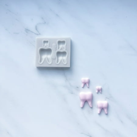

TOOTH QUAD MOLD