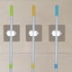 thumbnail image 5 of Ganchos para fregona y escoba, colgador de paraguas de pared con adhesivo resistente, herramientas de limpieza, 5 of 11
