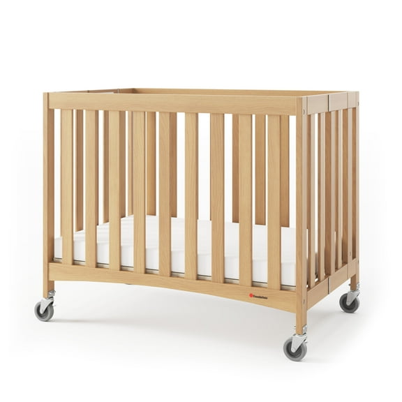 Foundations Travel Sleeper Compact Folding Hotel Crib with 2" Mattress and Locking Wheels, Natural