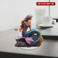 thumbnail image 4 of A rotating acrylic ornament featuring a colorful iridescent mermaid adorned with a necklace sitting gracefully on a rock against a white background, 4 of 8