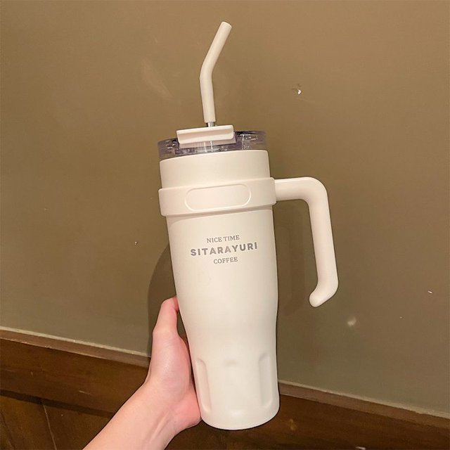 2024 nueva taza de agua termo taza de gran capacidad 304 de acero inoxidable hombres y mujeres taza portátil de coche ins de alta apariencia
