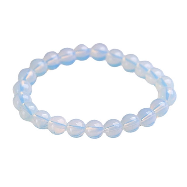 Una sarta de pulseras elásticas de piedras de colores de 8mm. Cuentas milimétricas, adecuadas para regalos de cumpleaños para hombres y niñas.