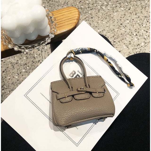 Mini bolso de platino con colgante para auriculares Bluetooth, bolso para pintalabios, bolsa de almacenamiento para cambiar, llavero de coche, adornos