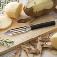 thumbnail image 4 of Rada Stainless Steel Vegetable Peeler, Razor Sharp Swiveling Blade follows Veggie Contours, Durable Black Resin Handle, 4 of 4