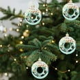 thumbnail image 4 of xihome Paquete de 4 adornos navideños de plstico en forma de estrella para la punta del rbol, decoraciones colgantes de donas, dulces y bagels para la decoracin navideña del rbol., 4 of 6