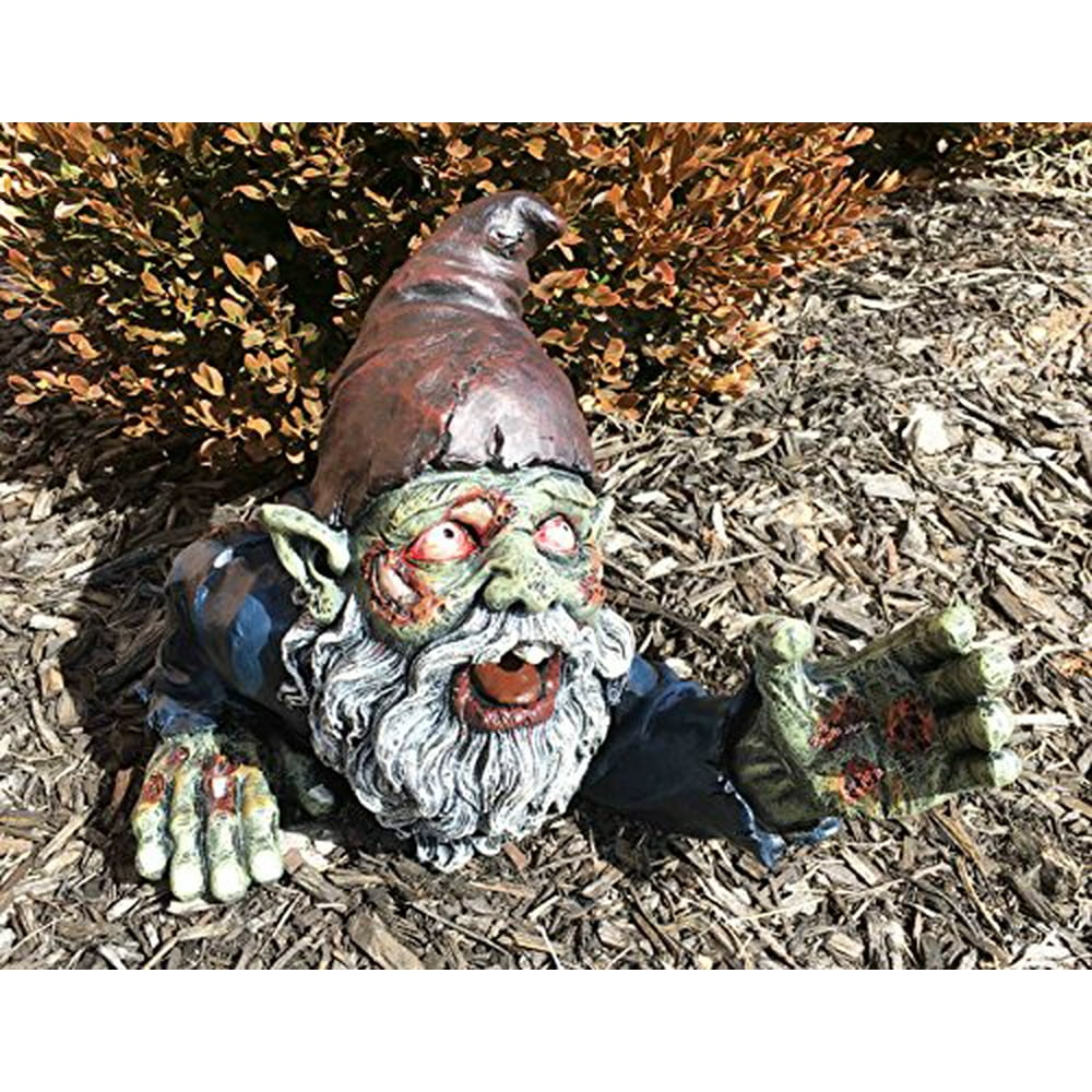 Zombie Gnome With Peeling Flesh and Bones Crawling Reaching For Prey