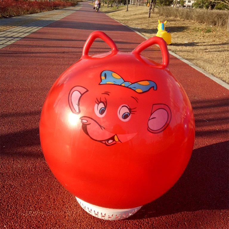 Orange bouncy hot sale ball with ears